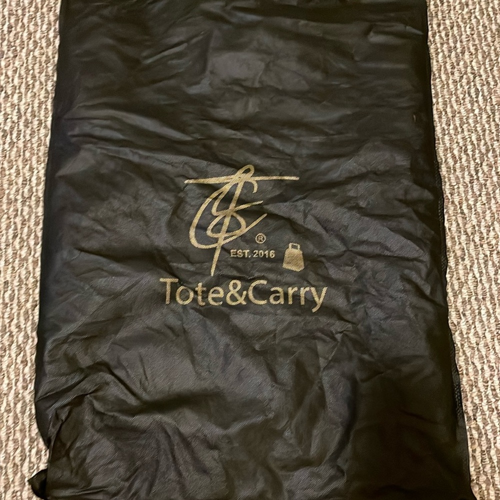Brand new Tote and Carry book bag ! With dust bag